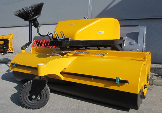 A Modularis Drive Loader Sweeper attachment designed for loaders and tractors, featuring a robust main brush and an optional side brush for versatile cleaning applications.